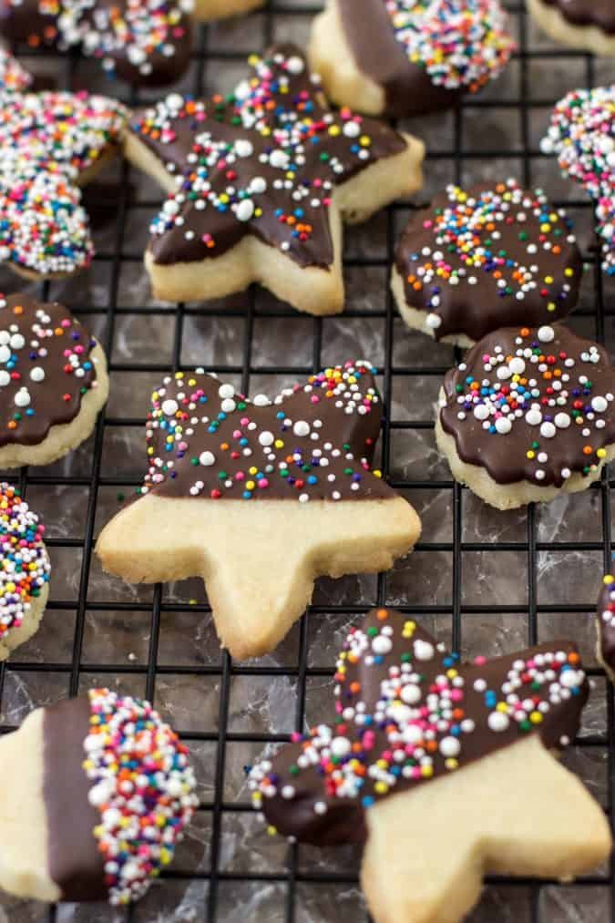 star shaped cookies with chocolate on cooling rack