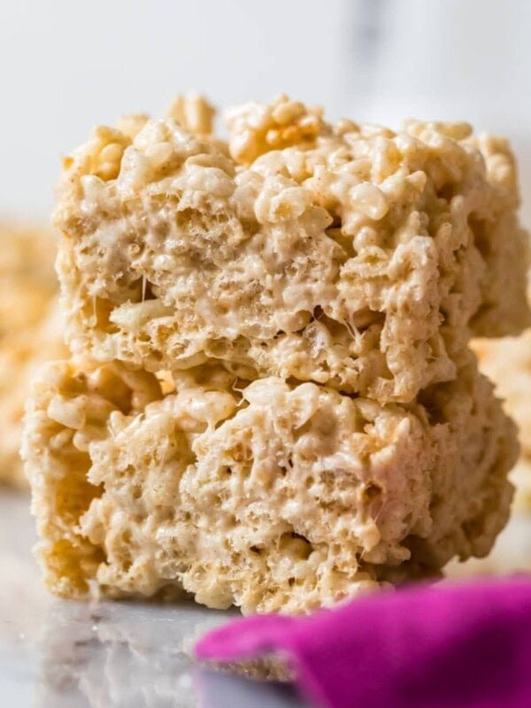 Two brown butter rice krispie treats stacked on top of each other.
