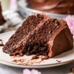 Slice of sourdough chocolate cake with a bite missing.